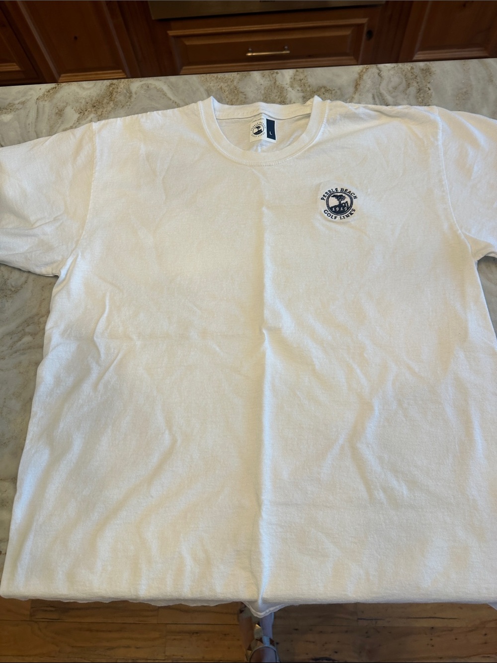 Pebble Beach White Short-Sleeve Graphic Tee with Small Chest Logo